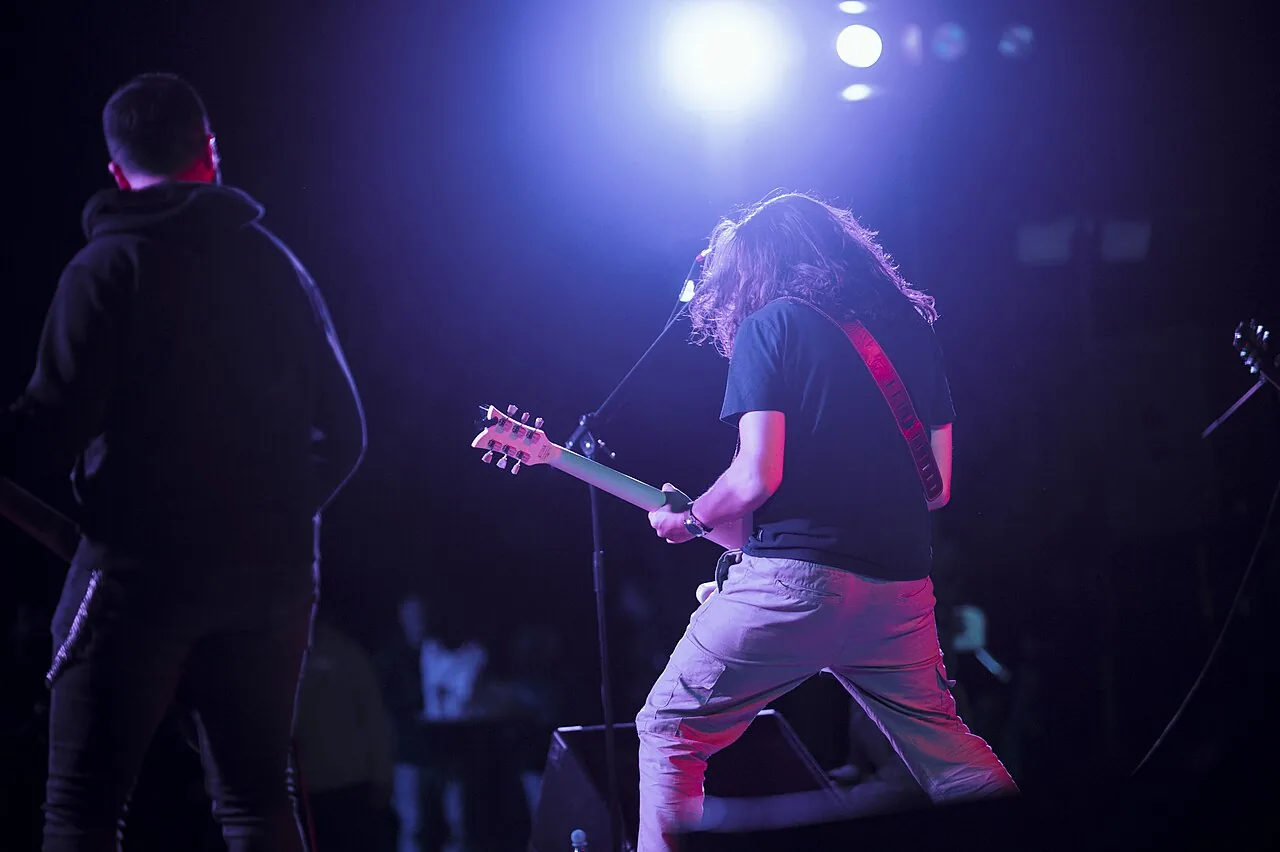 Band performs on stage during music festival